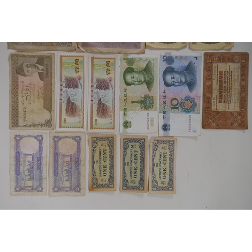 295 - A quantity of world banknotes, largest 9 x 11cm