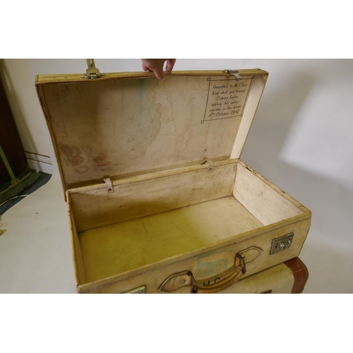 296 - A 1940s pigskin suitcase and two vintage cases, 67 x 39cm, 19cm high