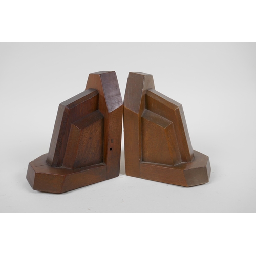 30 - A pair of 1920s Art Deco marble book ends, a pair of Art Deco style carved wood book ends, a pair of... 