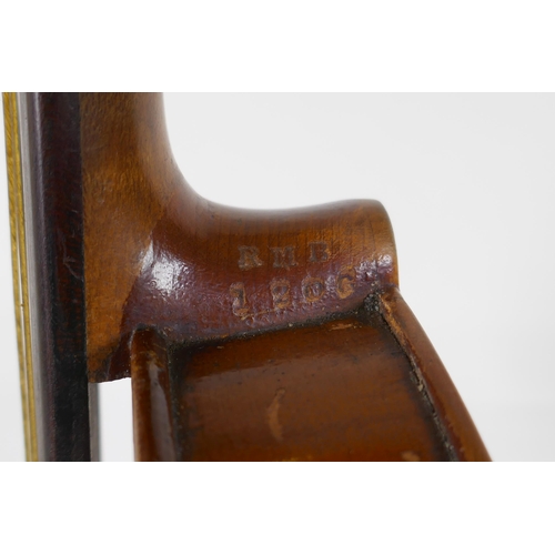 300 - A violin and bow, the neck of the violin stamped RMB 1206, in a carry case, violin 59cm long