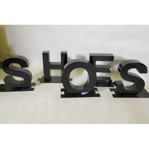 310 - A set of perspex shop display letters spelling Shoes, 40cm high