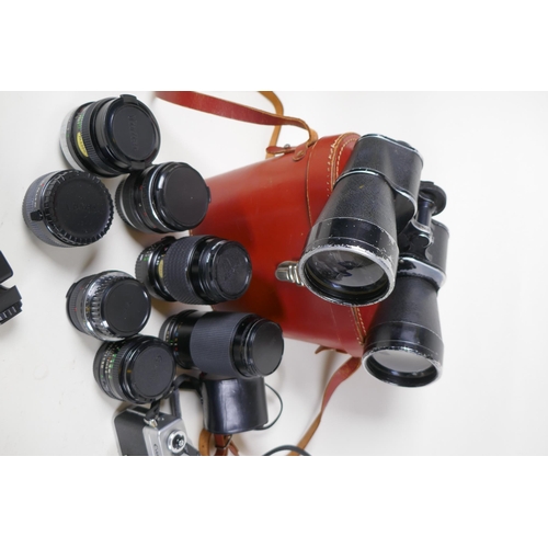 315 - A quantity of vintage cameras and equipment, including a Canon Coronet 28, a Canon AV 1, a Pentax ME... 