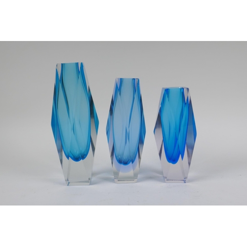 32 - Three 1960s graduated and faceted Murano 'Sommerso' glass vases, unmarked, largest 21cm high