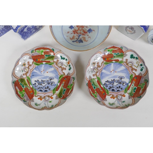 327 - A pair of Chinese Imari porcelain dishes with lobed rims, a Chinese Imari bowl, three blue and white... 