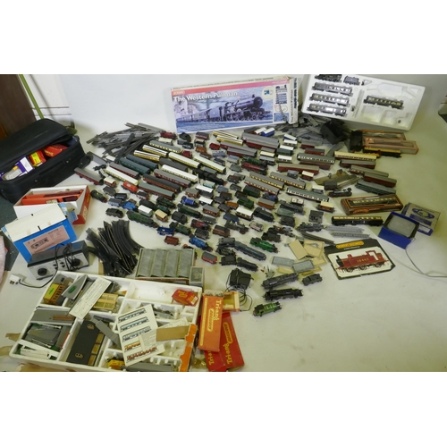 33 - A quantity of Hornby, Triang, Lima H0-00 engines, rolling stock, transformers, track etc