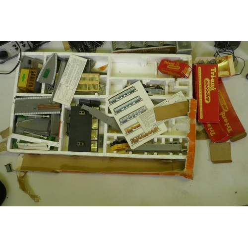 33 - A quantity of Hornby, Triang, Lima H0-00 engines, rolling stock, transformers, track etc