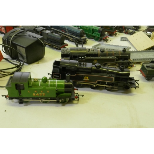 33 - A quantity of Hornby, Triang, Lima H0-00 engines, rolling stock, transformers, track etc