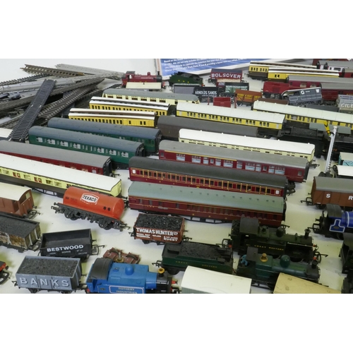 33 - A quantity of Hornby, Triang, Lima H0-00 engines, rolling stock, transformers, track etc