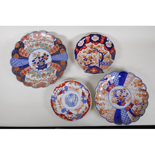 330 - Four Japanese Imari porcelain dishes of graduated sizes, two with filled rims and another in the for... 