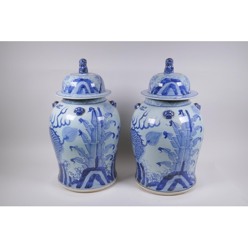 347 - A pair of Chinese blue and white porcelain jars and covers with lion mask, kylin and Fo-dog decorati... 