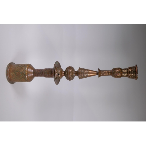 349 - A middle eastern copper and brass hookah pipe with repousse floral decoration, 72cm high