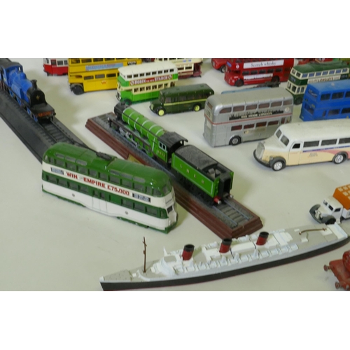 36 - A quantity of collector's die cast model buses, trains, ships etc