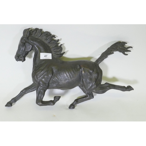 47 - A bronze figure of a galloping horse, unsigned, 40cm long