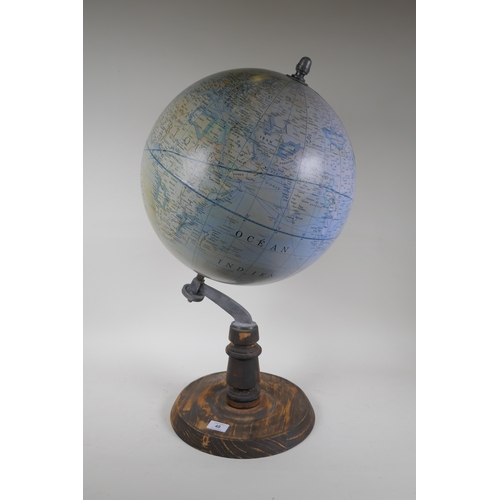 48 - A French terrestrial globe on wood stand, 70cm high