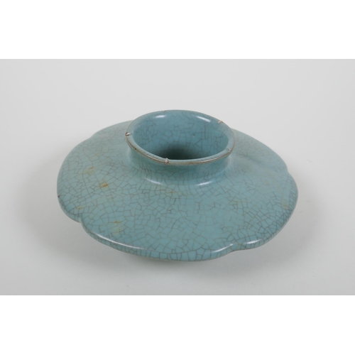 58 - A Chinese celadon crackle ware stand of flower petal form, chased character marks, 16cm diameter