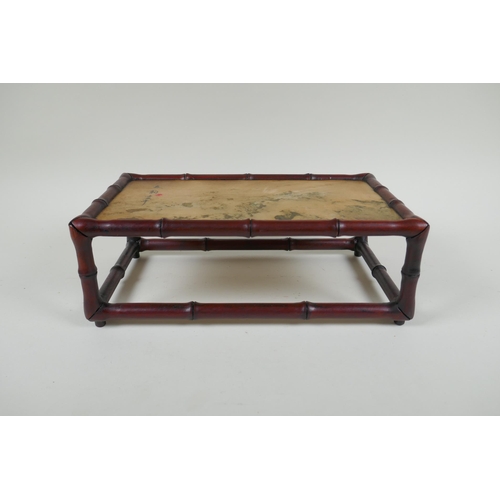 59 - A Chinese carved hardwood stand in the form of bamboo with inset marbled stone top, 30 x 17cm, 10cm ... 