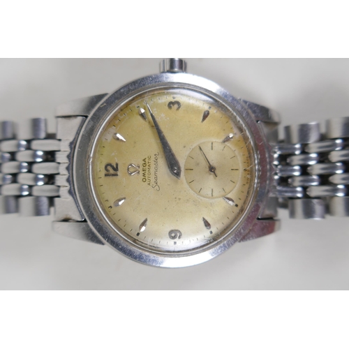 601 - A vintage stainless steel cased Omega Seamaster, the automatic movement with subsidiary second dial ... 