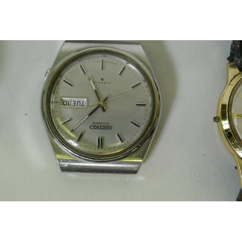 606 - A Seiko automatic stainless steel gentleman's wristwatch, with straps and a vintage Target automatic... 