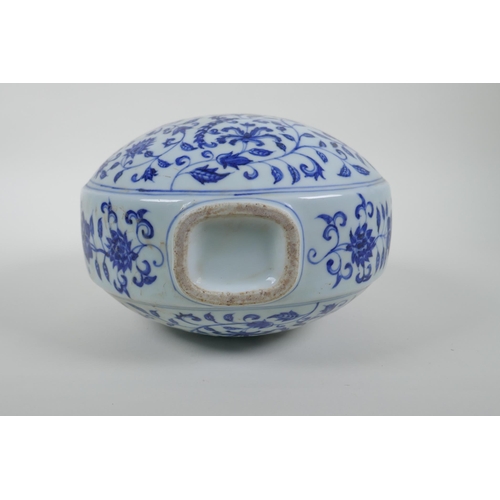 62 - A blue and white moon flask with two handles and scrolling floral decoration, Chinese Xuande 6 chara... 