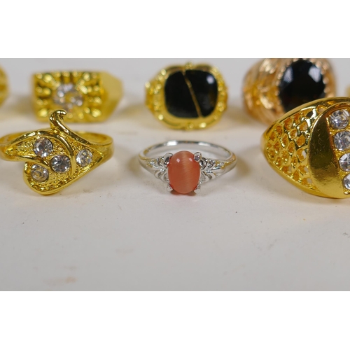 628 - Ten gilt metal and white metal costume rings, various sizes