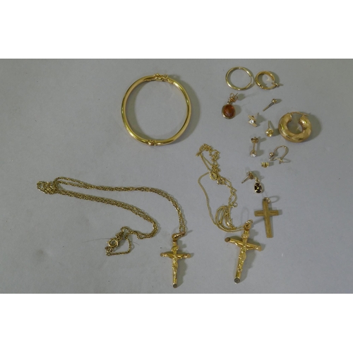 638 - 9ct gold, three crucifix, chains and hoop earrings, studs and pendants, 7.7g weighable gold, 9.4g gr... 