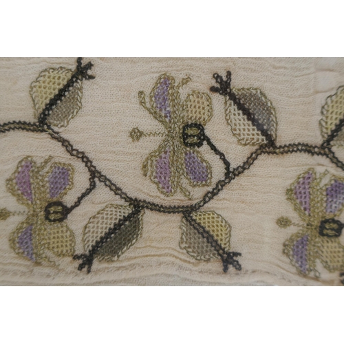 65 - A C19th embroidery of a floral vine, with gilt thread details, framed, 26 x 42cm