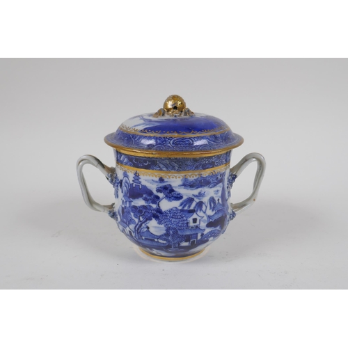 79 - An C18th Pearlware two handled jar and cover, decorated with the Willow pattern, with historic repai... 