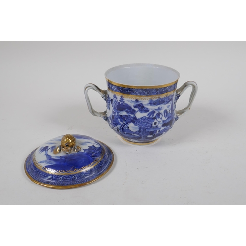 79 - An C18th Pearlware two handled jar and cover, decorated with the Willow pattern, with historic repai... 