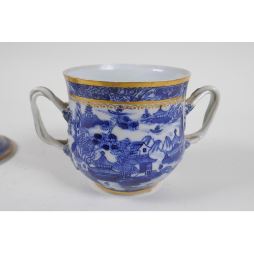 79 - An C18th Pearlware two handled jar and cover, decorated with the Willow pattern, with historic repai... 