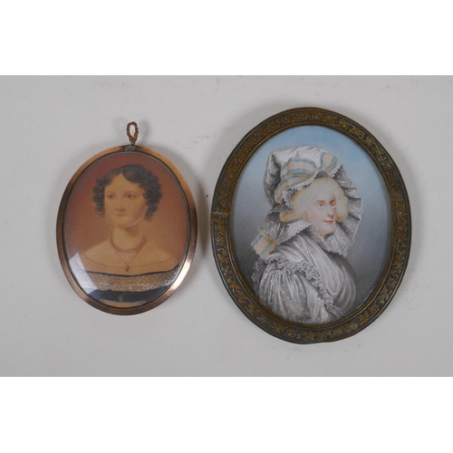 809 - An early C19th miniature watercolour portrait of a lady in a rose metal pendant frame, with plaited ... 