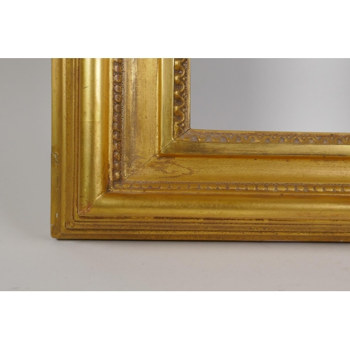 848 - An early C19th giltwood picture frame with bead decoration, 36.5 x 23cm rebate