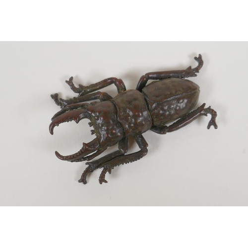 89 - A Japanese style bronze okimono stag beetle, 6cm long