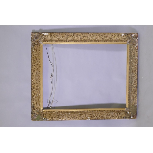 906 - A C19th giltwood and composition picture frame, AF, rebate 71 x 92cm