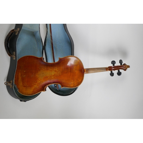 96 - A vintage violin with single piece back, stamped Stainer to the back, together with a bow and carry ... 