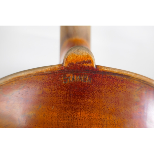 96 - A vintage violin with single piece back, stamped Stainer to the back, together with a bow and carry ... 