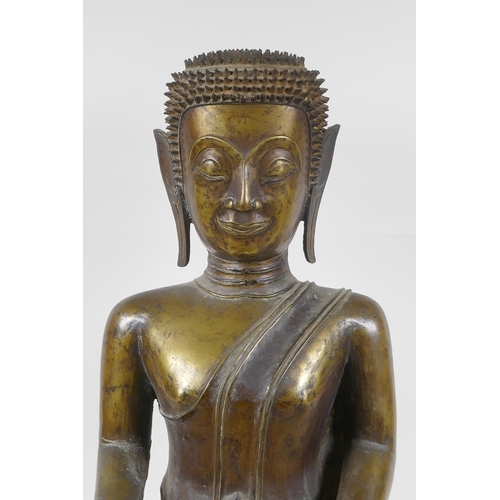 5 - An C18th (?) bronze Buddha, probably Burmese, with historic repairs, 46cm high