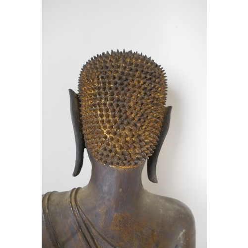 5 - An C18th (?) bronze Buddha, probably Burmese, with historic repairs, 46cm high