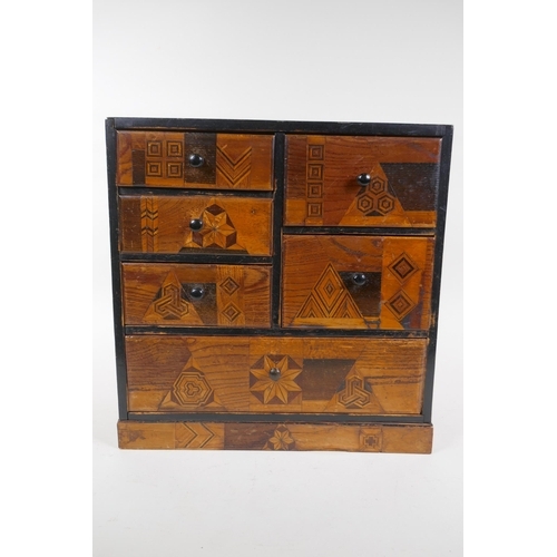 11 - A Japanese Meiji Yosegi-Zaiku marquetry jewellery cabinet of six drawers, 30 x 14cm, 31cm high