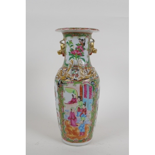 24 - A Chinese C19th Cantonese famille rose porcelain vase with gilt fo-dog handles and decorative panels... 