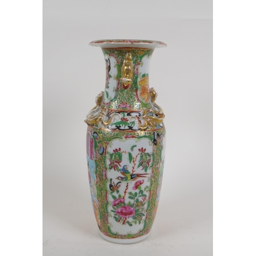 24 - A Chinese C19th Cantonese famille rose porcelain vase with gilt fo-dog handles and decorative panels... 