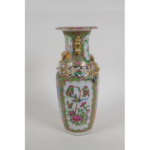 24 - A Chinese C19th Cantonese famille rose porcelain vase with gilt fo-dog handles and decorative panels... 