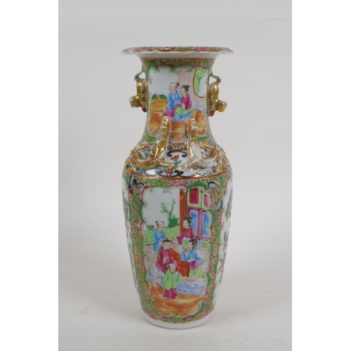 24 - A Chinese C19th Cantonese famille rose porcelain vase with gilt fo-dog handles and decorative panels... 