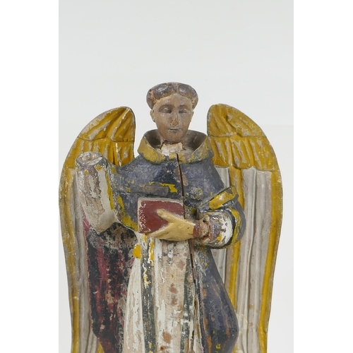 25 - A C19th carved and painted limewood figure of a saint, AF repair, 35cm high