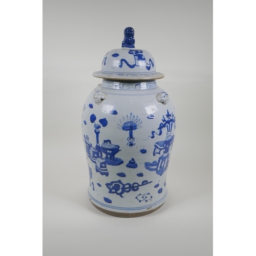 35 - An early C20th Chinese blue and white porcelain jar and cover with four lion mask handles, a Fo-dog ... 