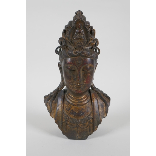 42 - A Chinese filled gilt bronze bust of Quan Yin, 21cm high