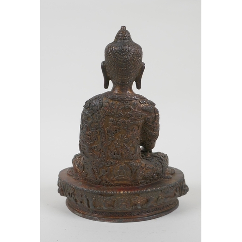 66 - A Tibetan gilt bronze figure of Buddha seated in meditation, impressed double vajra mark to base, 22... 