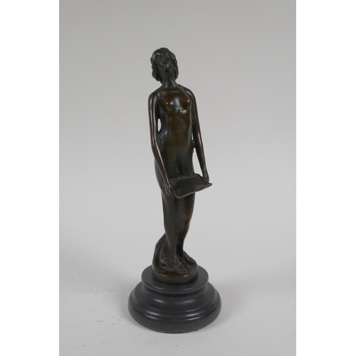 71 - An Art Nouveau style bronze figure of a woman carrying a tray, 19cm high