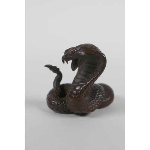 88 - A Japanese style bronze okimono cobra, seal mark to base, 4cm high