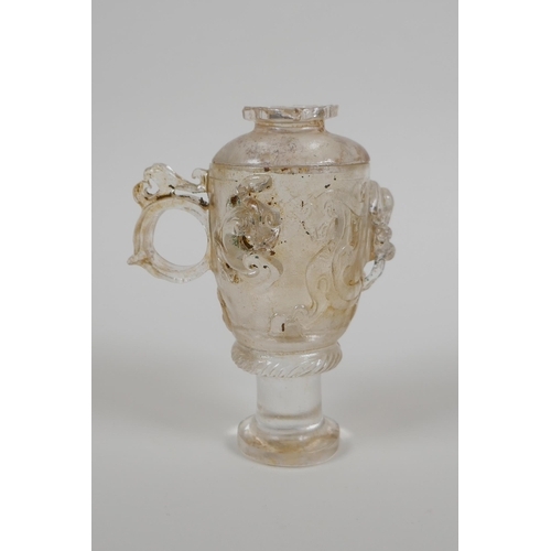 119 - A Chinese glass libation cup and cover with dragon and kylin decoration, 12cm high