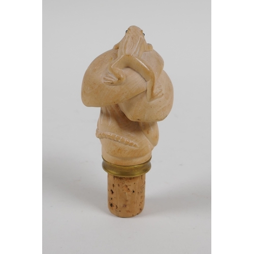 122 - A carved boxwood bottle stopper in the form of mushrooms, toad and rat, 10cm